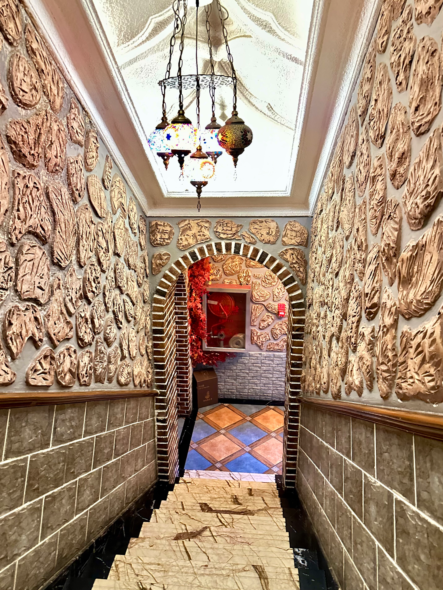 The stairwell of a Kashgar restaurant
